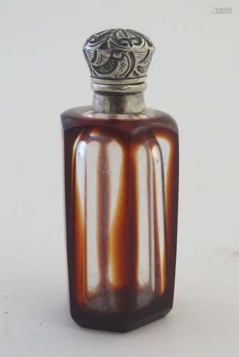 Glass: a late 19th-early 20thC glass scent bottle, of hexagonal form with red outlining and white