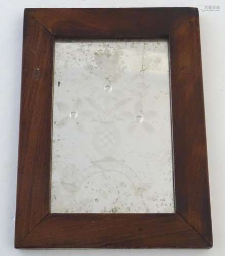 A 19thC mirror with etched floral design in a yew wood frame. Approx. 9 1/4