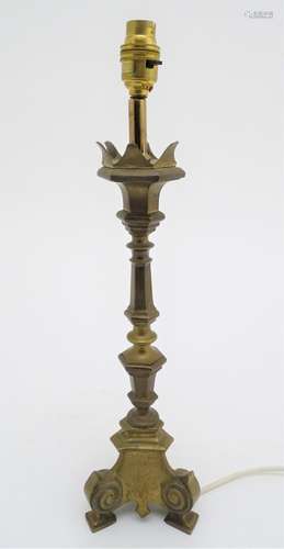 A late 19th / early 20thC cast table lamp with castellated top. Approx. 19 1/2