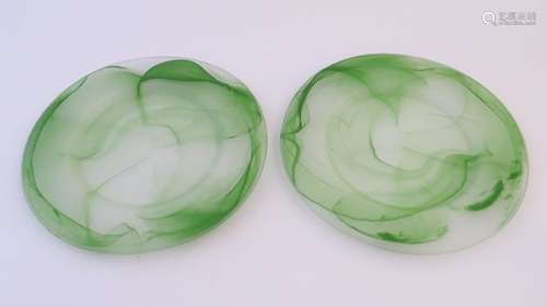 A pair of Art Deco frosted glass plates, each with green waved abstract decoration and measuring 13