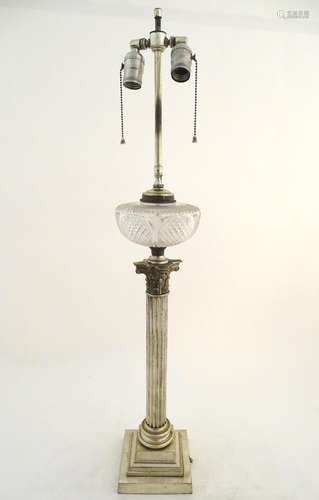 An early-20thC American silver plated and cut glass table lamp, the base formed as a corinthian