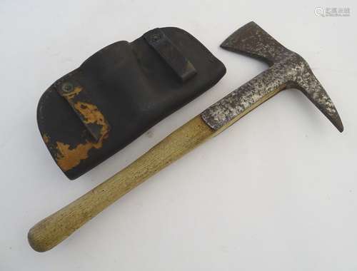 An early-20thC fireman's hand axe, with leather sheath, 15