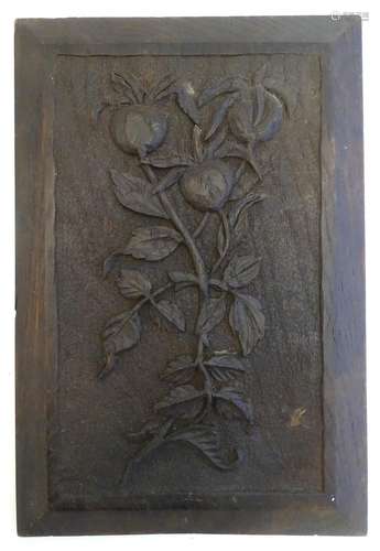 A late 19th / early 20thC carved panel with a stylised depictions of fruiting pomegranate. Approx.