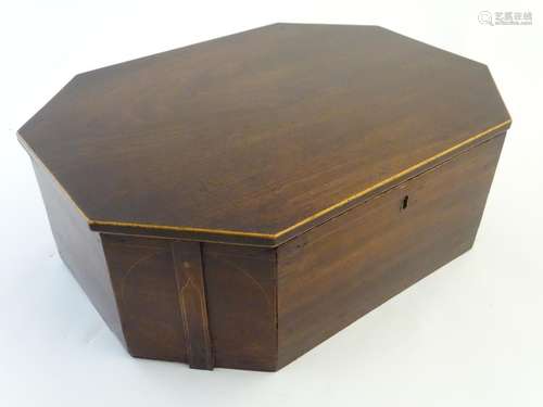 A Regency mahogany dressing/vanity case, of elongated octagonal form with boxwood inlays. 18