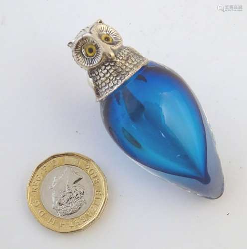 A 21stC novelty blue glass scent bottle, of drop form with metal top formed as the head of an owl. 2