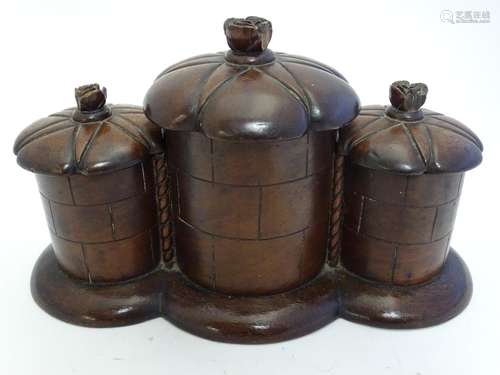 An unusual late 19th / early 20thC treen three- sectional box, possibly a caddy, the cylindrical