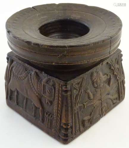 An 18th / 19thC Indian carved wooden stand with a rectangular base and circular top. The base carved