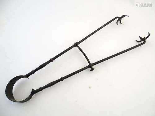 Garden & Architectural, Salvage: a 19thC large pair of fire/log tongs, of cast iron construction