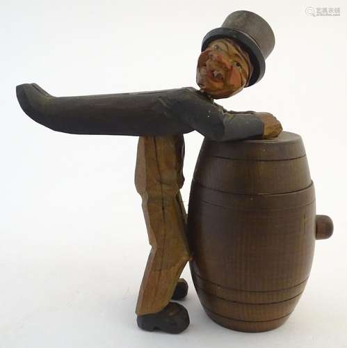 A mid-20thC Bavarian/Black Forest novelty tobacco pot, formed as an inebriated caricature in top hat