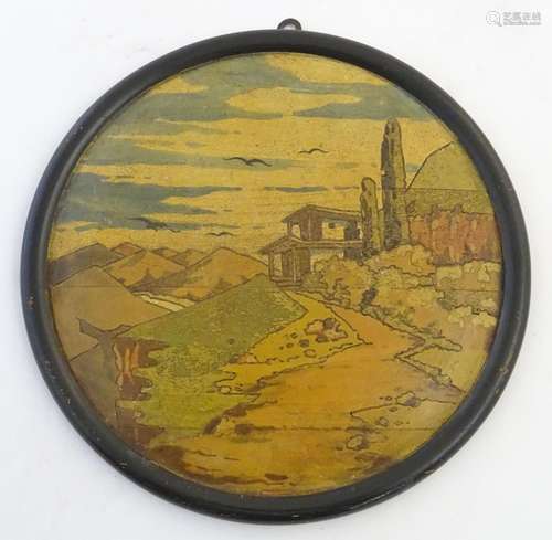 An early 20thC circular wooden plaque decorated with a mountainous landscape. Approx 10