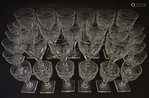 Glass: an extensive, graduated set of 19thC drinking glasses, each decorated with etched floral