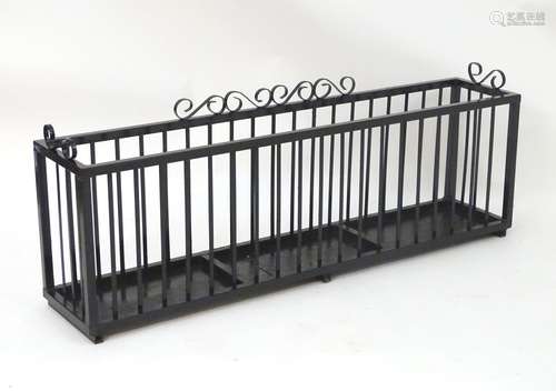 Garden & Architectural, Salvage: a 20thC wrought iron stick stand/planter, with black painted finish