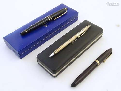 A cased ball pen by Cross USA, marked 925 silver, together with a Swan 'leverless' fountain pen, the