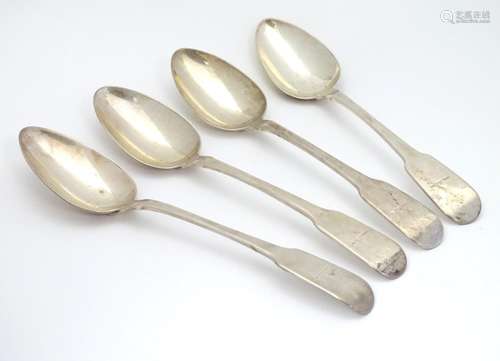 A set of four Geo III silver fiddle pattern table spoons. Hallmarked London 1798 maker George Smith.