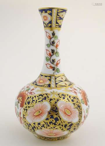 A 19thC Stevenson and Hancock Derby vase decorated with flowers in the Imari palette. Marked