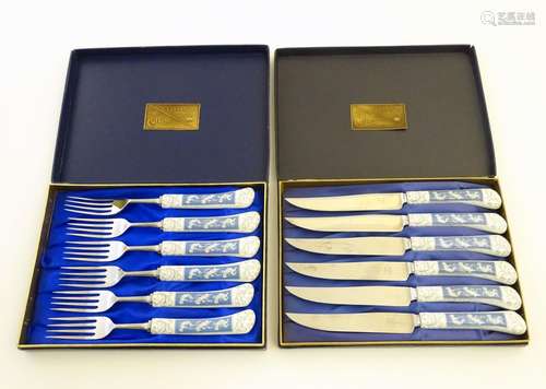 A cased set of six Coalport handled forks and a cased set of six Coalport handled knives, both