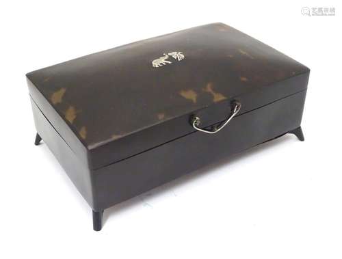 A Victorian tortoiseshell box / table snuff with hinged lid with piqué inlay depicting an elephant