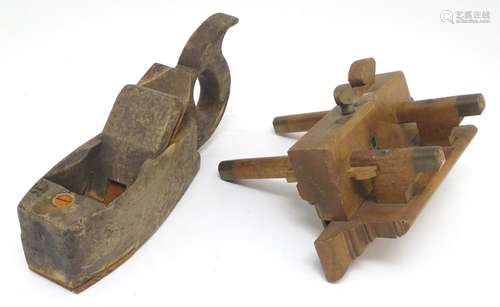 Two early-20thC woodworking/carpentry tools, comprising a coffin plane and a rebate plane (stamped