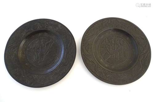 A pair of Chinese bronze plates / chargers with engraved / incised decoration, the centre