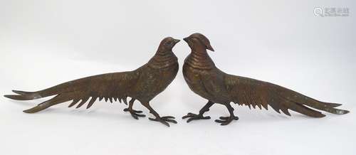 A pair of cast menu holders formed as Lady Amherst pheasants. Largest approx. 11