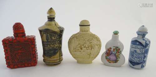 Five assorted 20thC Oriental snuff bottles of varying shapes and sizes. The tallest 3 1/2