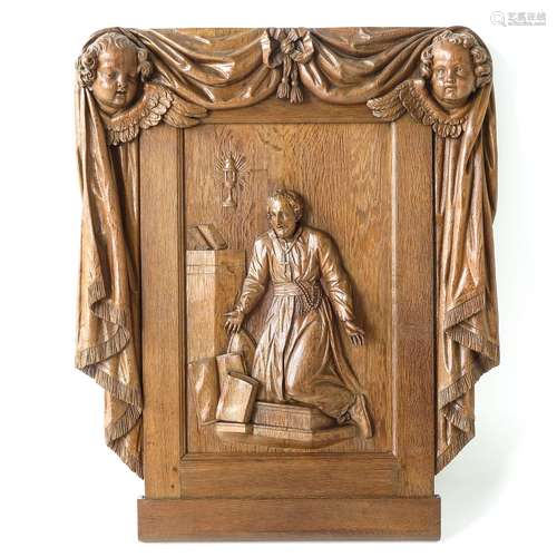 A Carved Oak Religious Panel