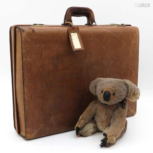 A Vintage Leather Case and Antique Koala Beer