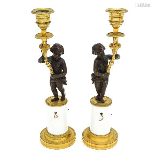 A Pair of 19th Century Empire Candlesticks