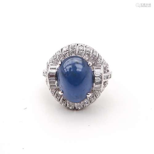 A Ladies 14KG Diamond and Star Sapphire Ring