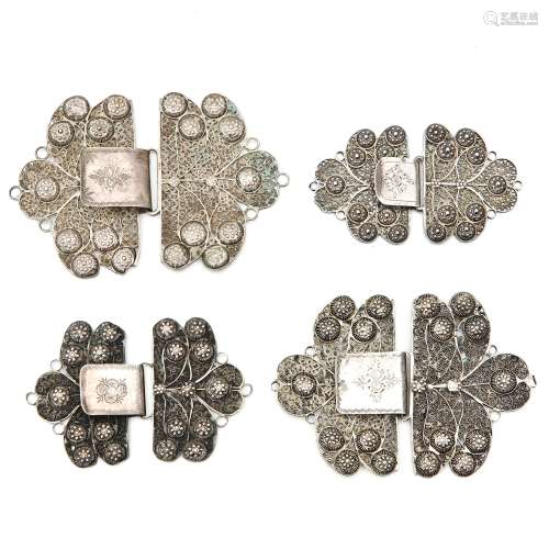 A Collection of Four Silver Clasps