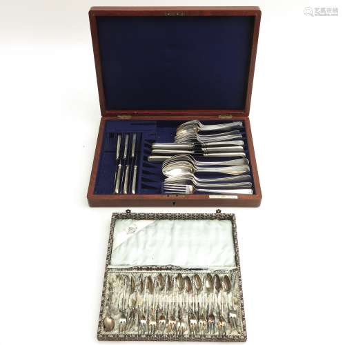 Two Cassettes with Silver Cutlery