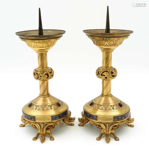 A Pair of Bronze and Enamel Church Candlesticks