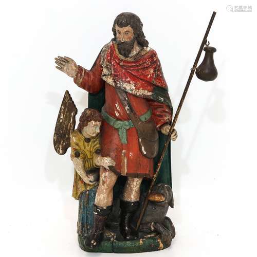 An 18th Century Carved Wood St. Roch Sculpture