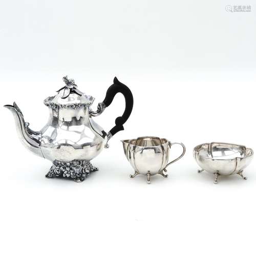 A Silver Coffee Pot and Creamer