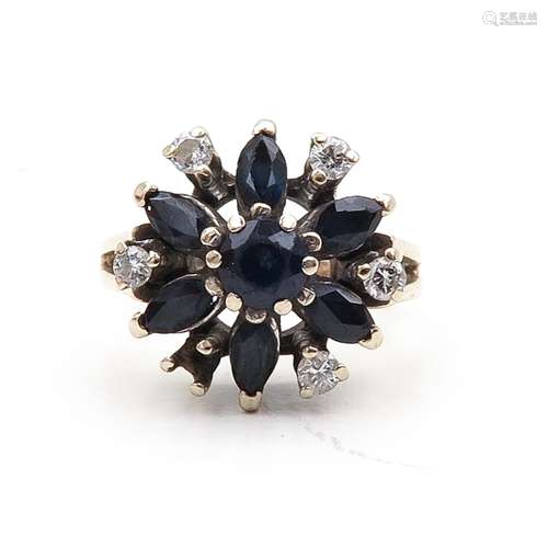 A Ladies Diamond and Sapphire Ring