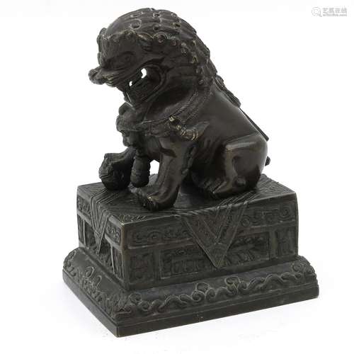 A Bronze Temple Lion Sculpture