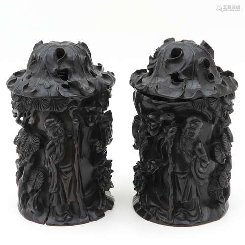 A Pair of Carved Wood Vases with Cover