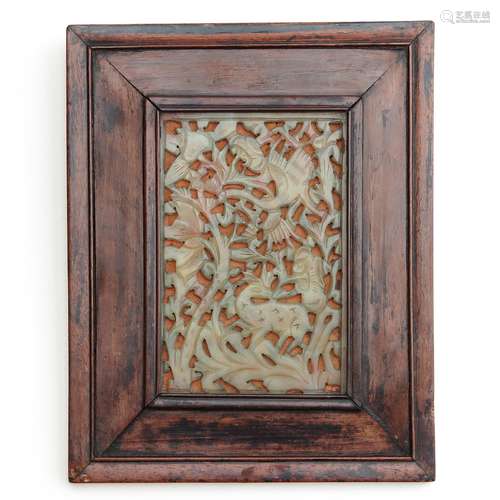 A Carved Jade Plaque in Wood Frame