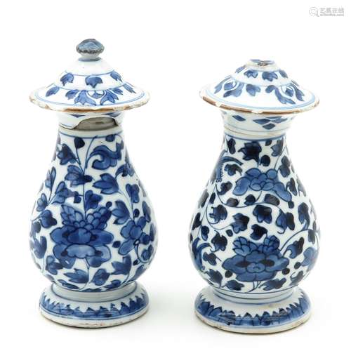 A Pair of Blue and White Covered Vases