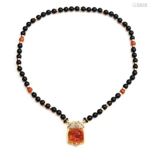 An Onyx and Jade Necklace