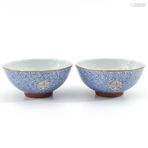 A Pair of Blue and Orange Decor Cups