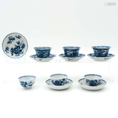 A Collection of Six Cups and Saucers