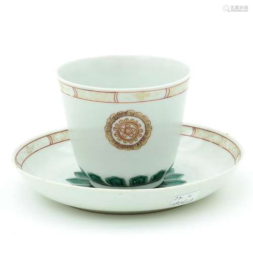 A Polychrome Cup and Saucer