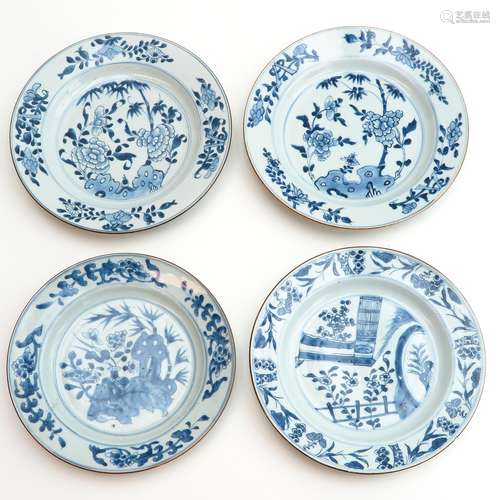 A Series of Four Blue and White Plates