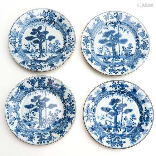 A Series of Four Blue and White Plates