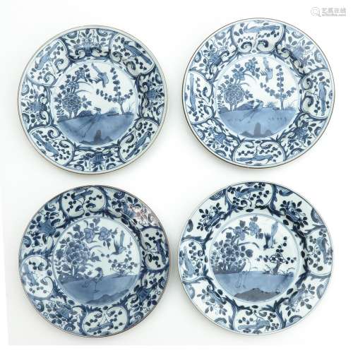 A Series of Four Blue and White Plates