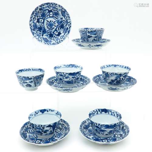 Six Blue and White Cups and Saucers