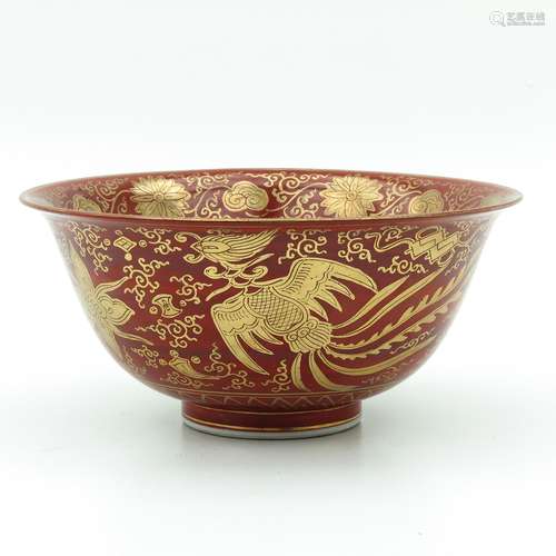 An Orange and Gilt Bowl