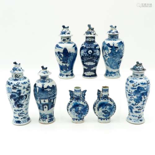 A Collection of 8 Garniture Vases