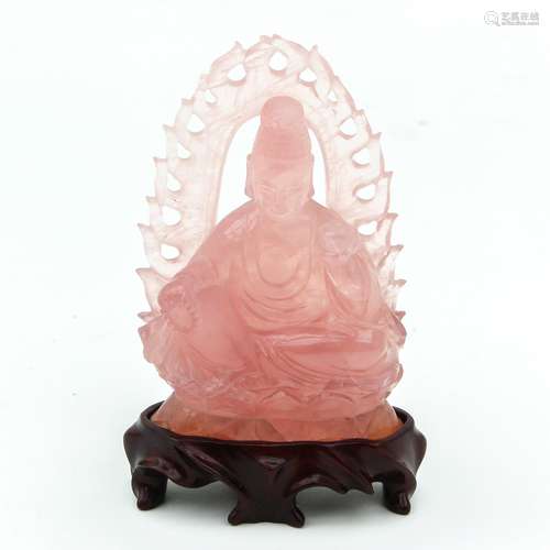 A Carved Pink Quartz Buddha Sculpture